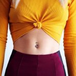 How can a woman remove fat from her stomach and sides at home?