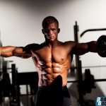 Махи гантелей в стороны